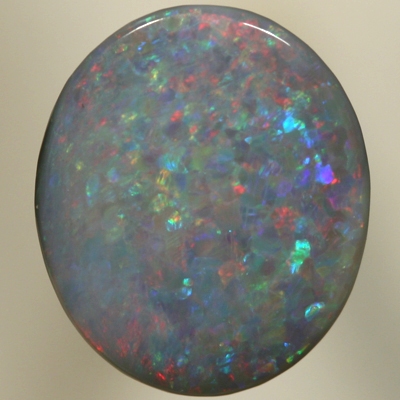 SOLID SEMI BLACK OPAL Sparkles of red over blue with a touch of green